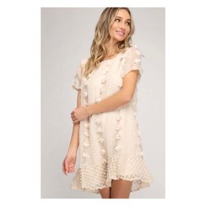 Off white mini dress with pom poms